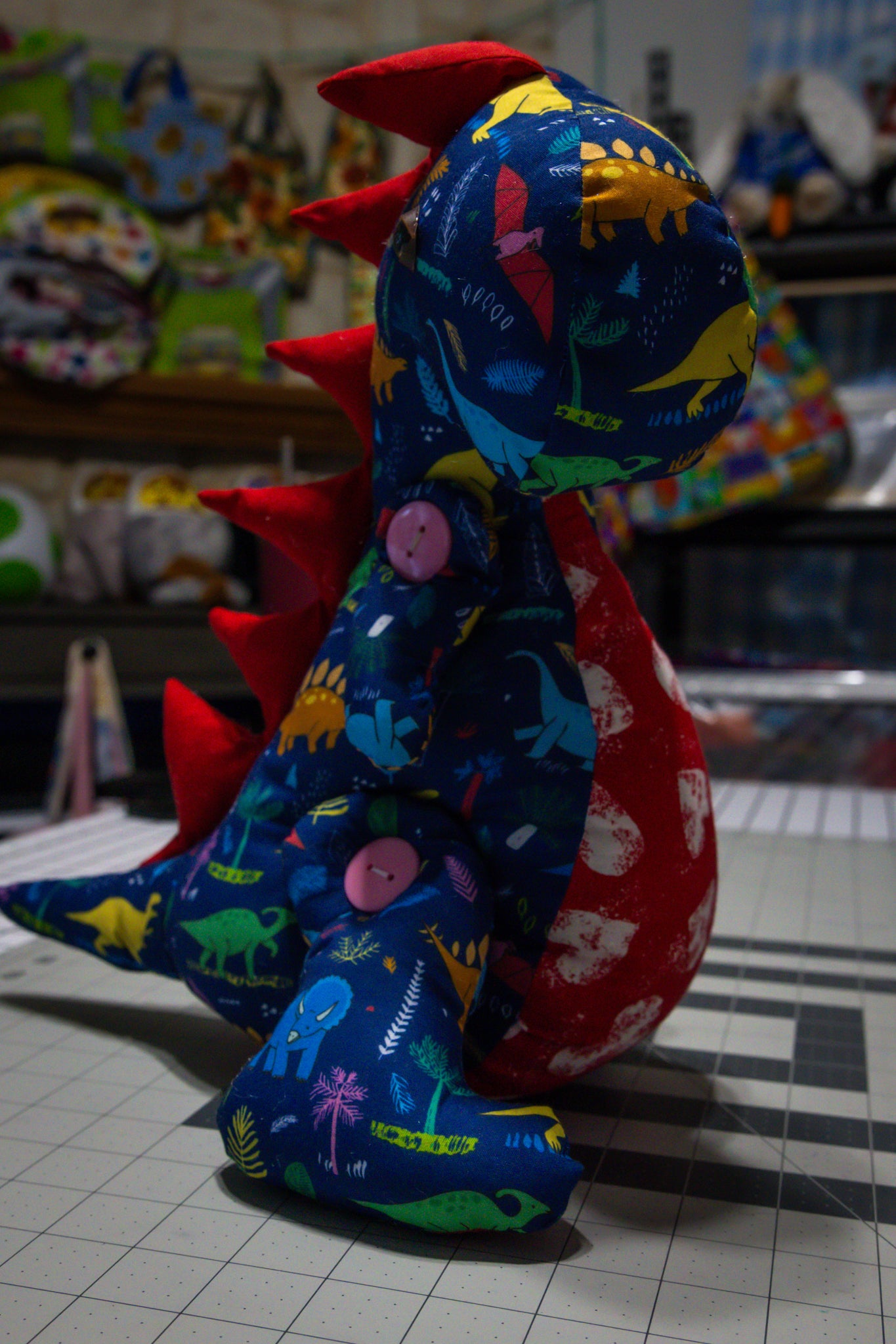 Handcrafted Blue Dinosaur Patterned Dragon Plush with Fiery Red Accents