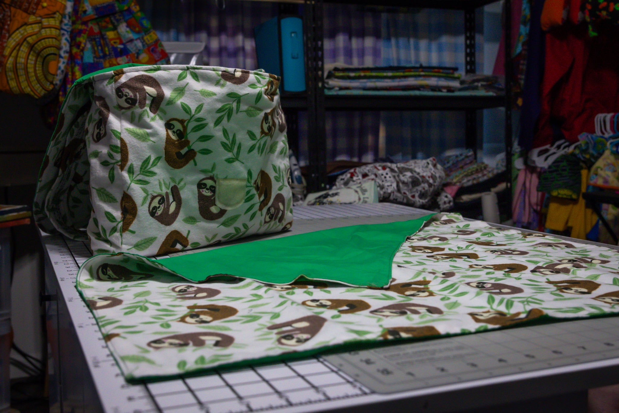 Handcrafted Sloth Pattern Dog Care Backpack with Green Accents and Pet Essentials
