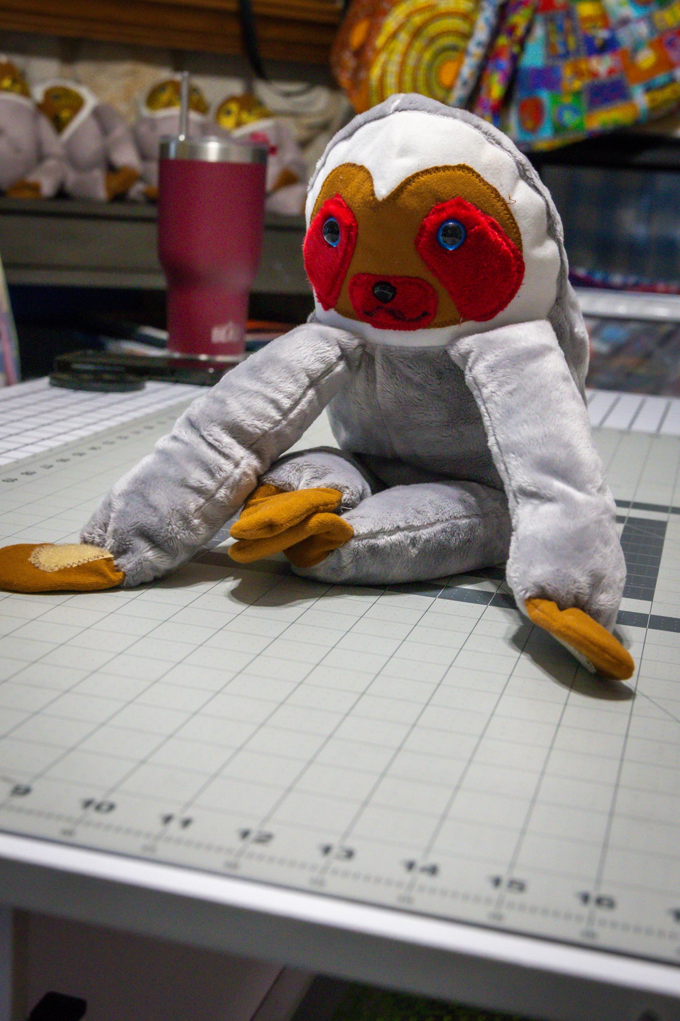 Handcrafted Grey Velcro Sloth Plush with Orange Face and Red Eye Accents