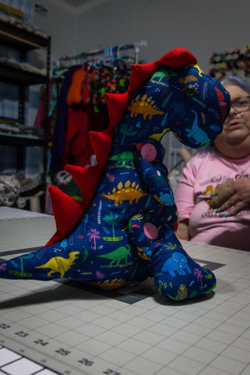 Handcrafted Blue Dinosaur Patterned Dragon Plush with Fiery Red Accents