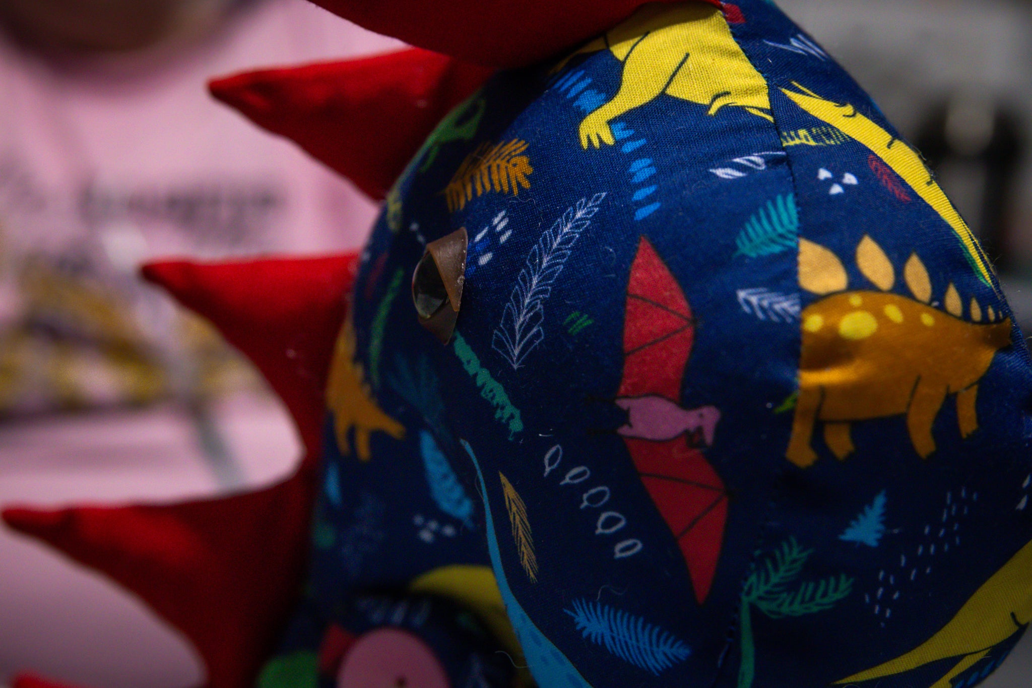 Handcrafted Blue Dinosaur Patterned Dragon Plush with Fiery Red Accents