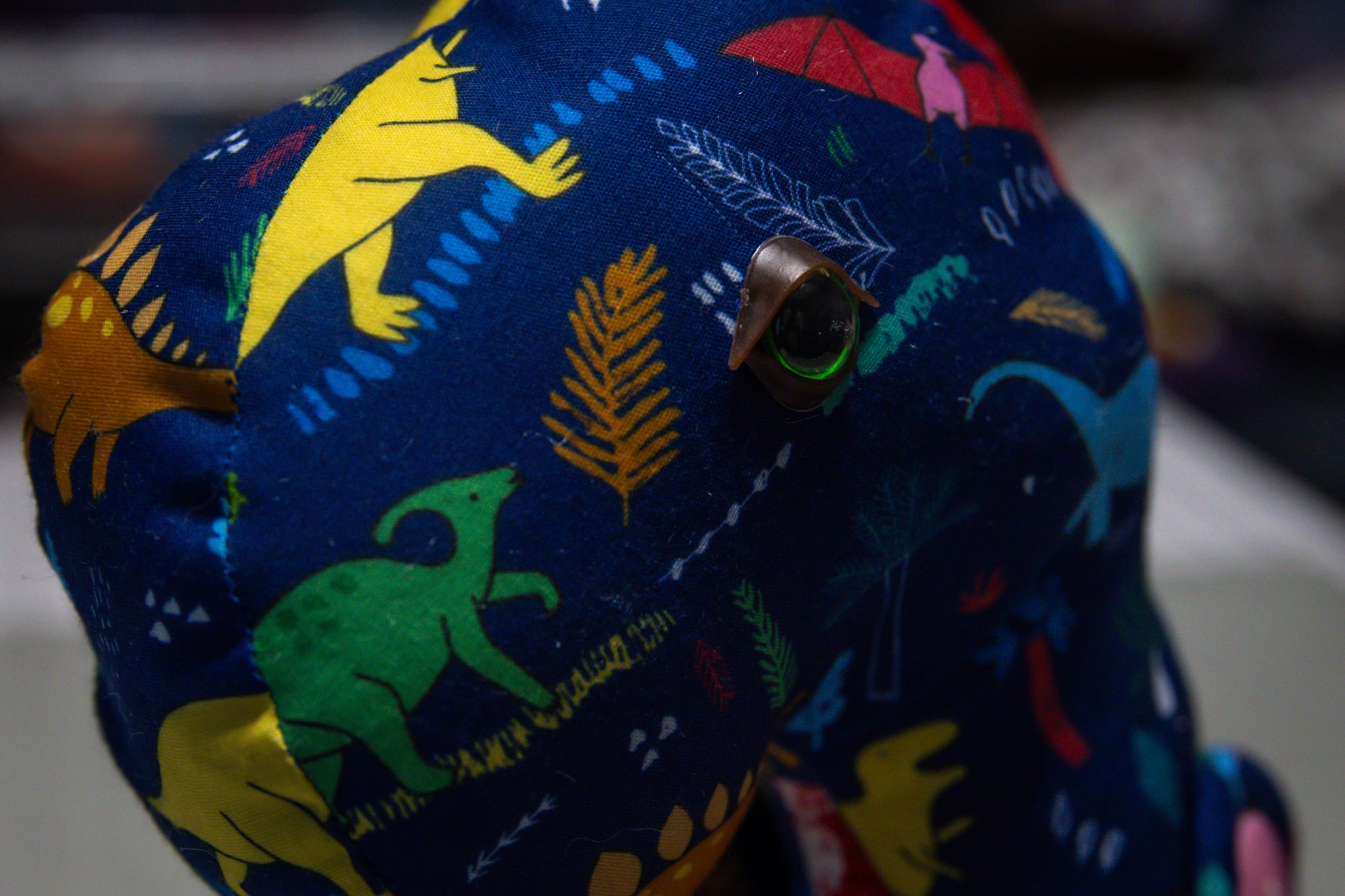 Handcrafted Blue Dinosaur Patterned Dragon Plush with Fiery Red Accents
