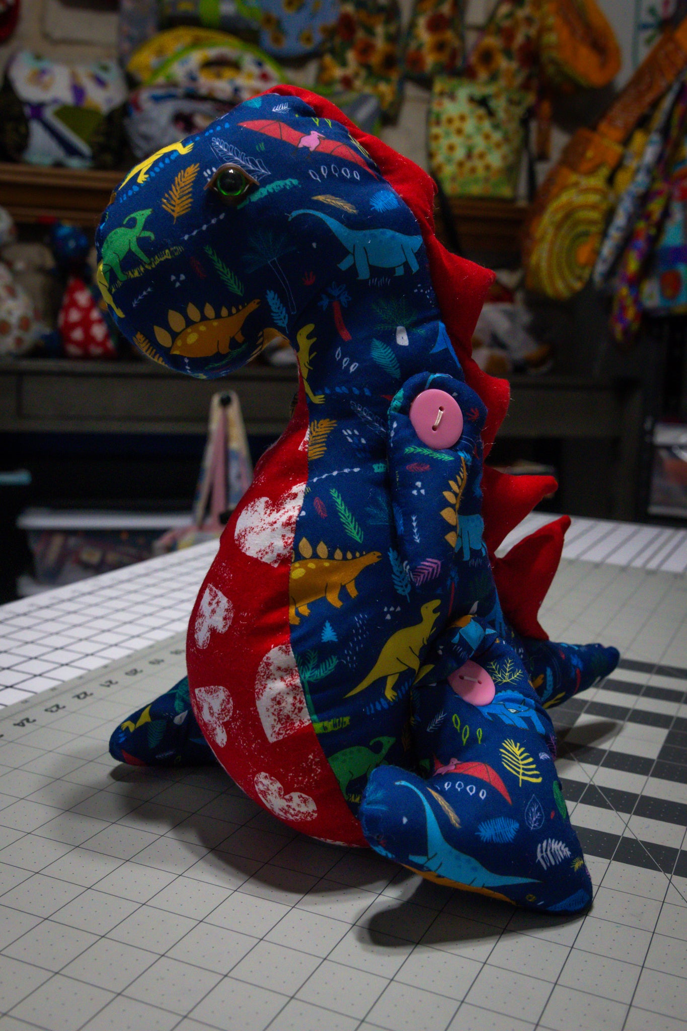 Handcrafted Blue Dinosaur Patterned Dragon Plush with Fiery Red Accents