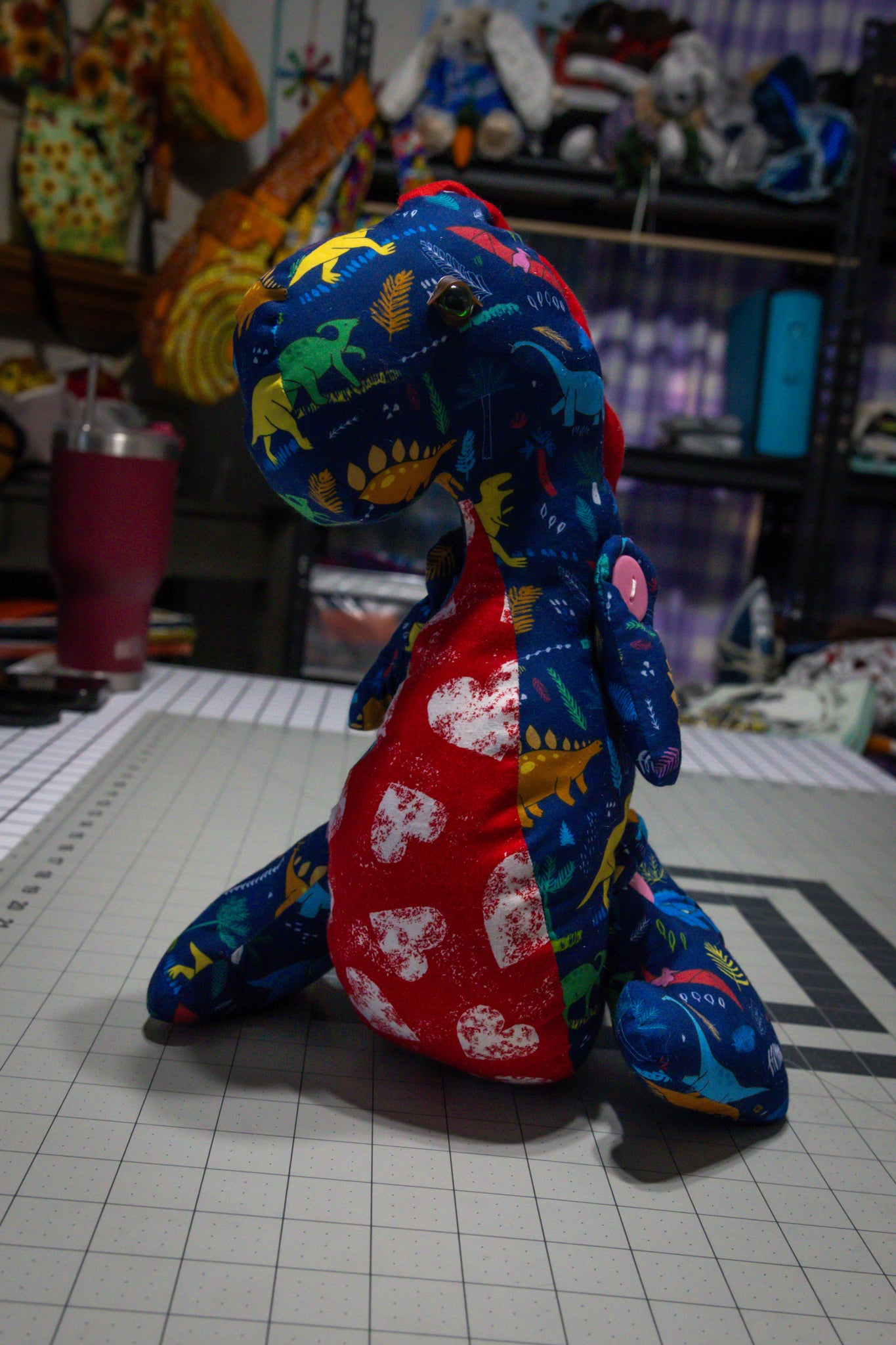 Handcrafted Blue Dinosaur Patterned Dragon Plush with Fiery Red Accents