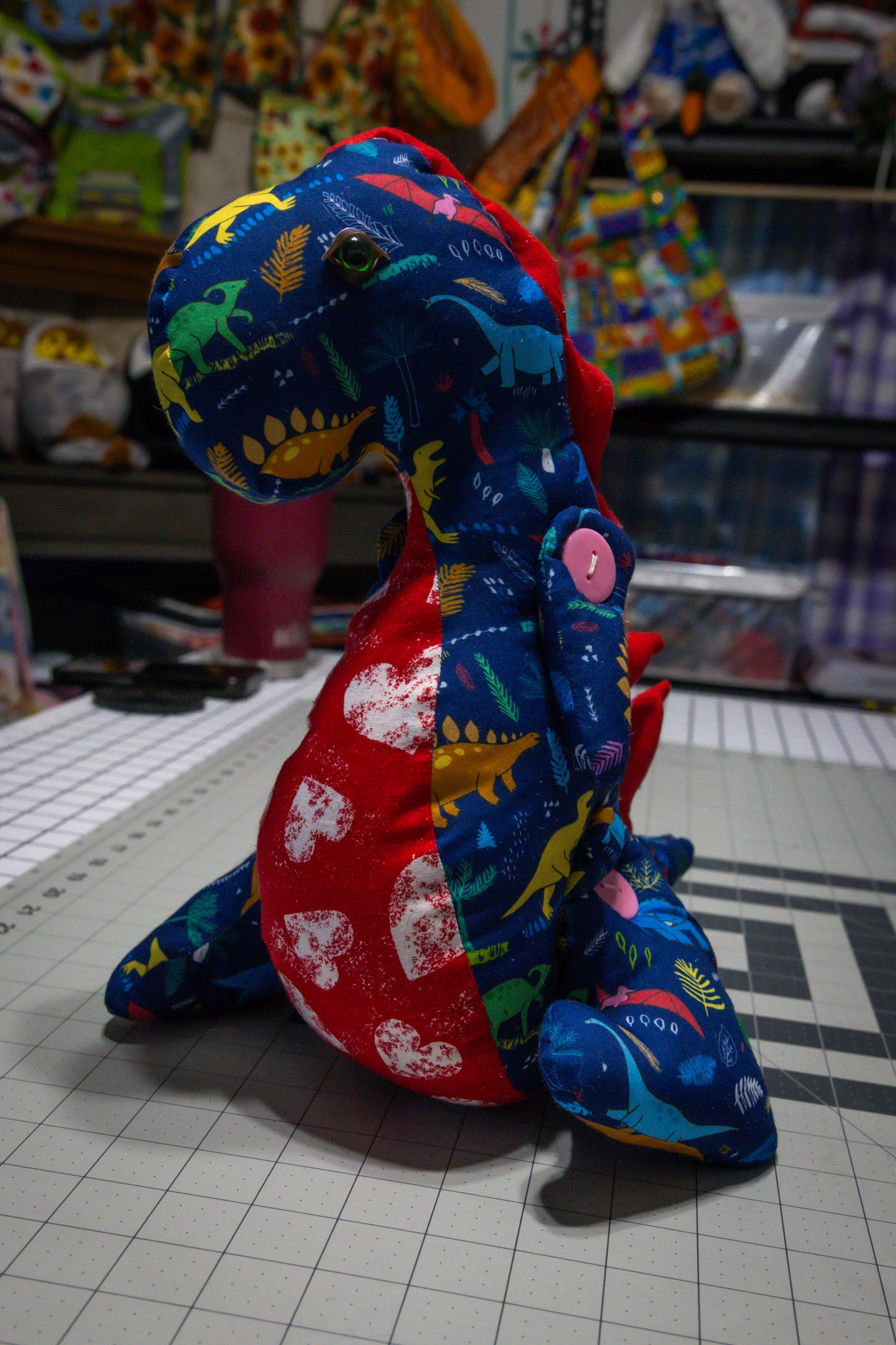 Handcrafted Blue Dinosaur Patterned Dragon Plush with Fiery Red Accents